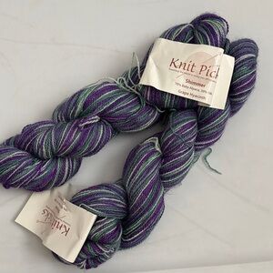 Knit Picks Shimmer Yarn in Purple, White, and Green